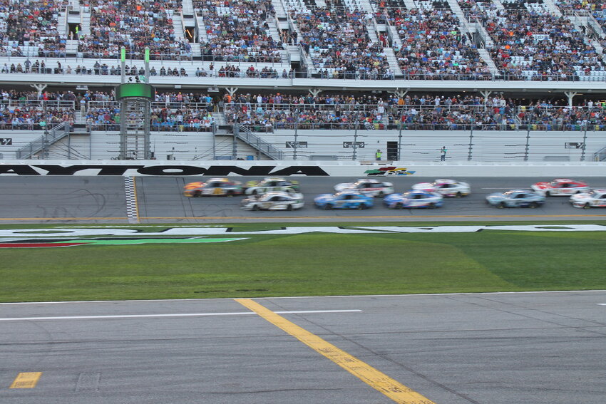Bubba Wallace leads to field to green in the 2023 Daytona 500.