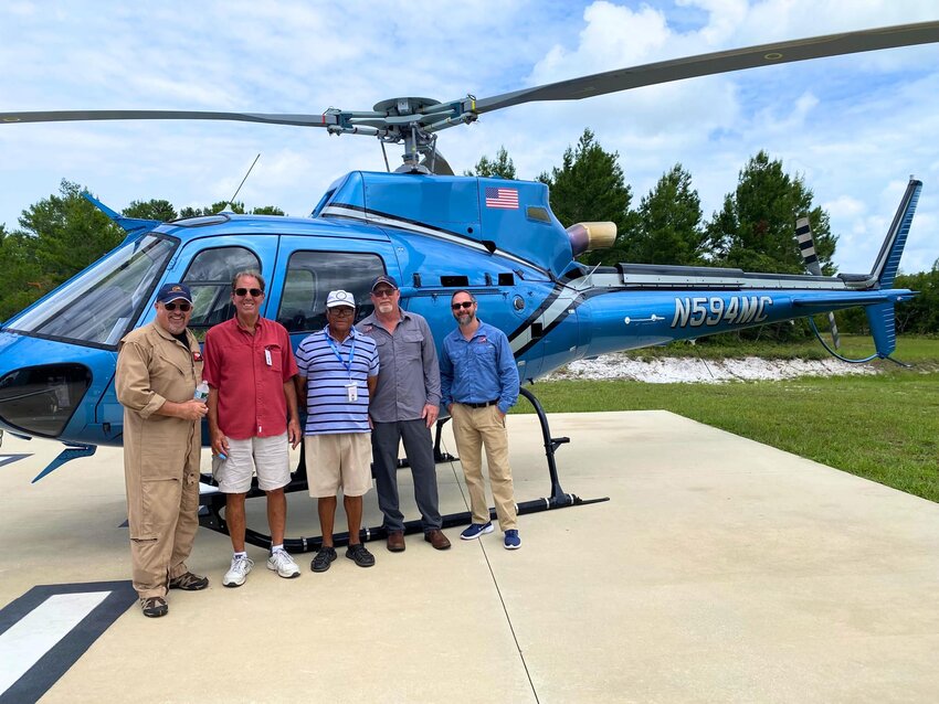 L-R: Pilot T.C. Cunha, Mosquito Control Commissioners Mike Martin and Ralph Lightfoot, Senior Field Tech Rob Fisch, and Mosquito Control Director Mark Positano.