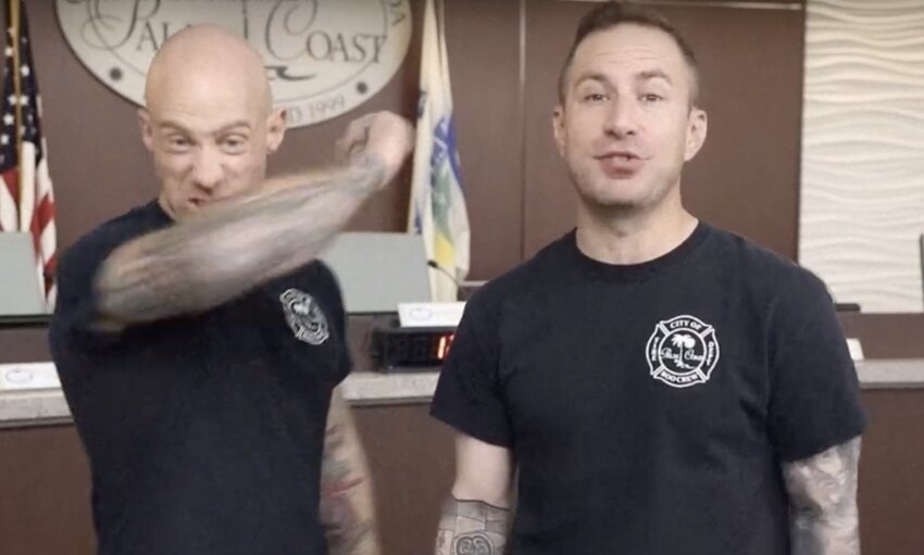 The PCFD's Dan Driscoll and Patrick Appolonia prepare their scare technique for the Hall of Terror.