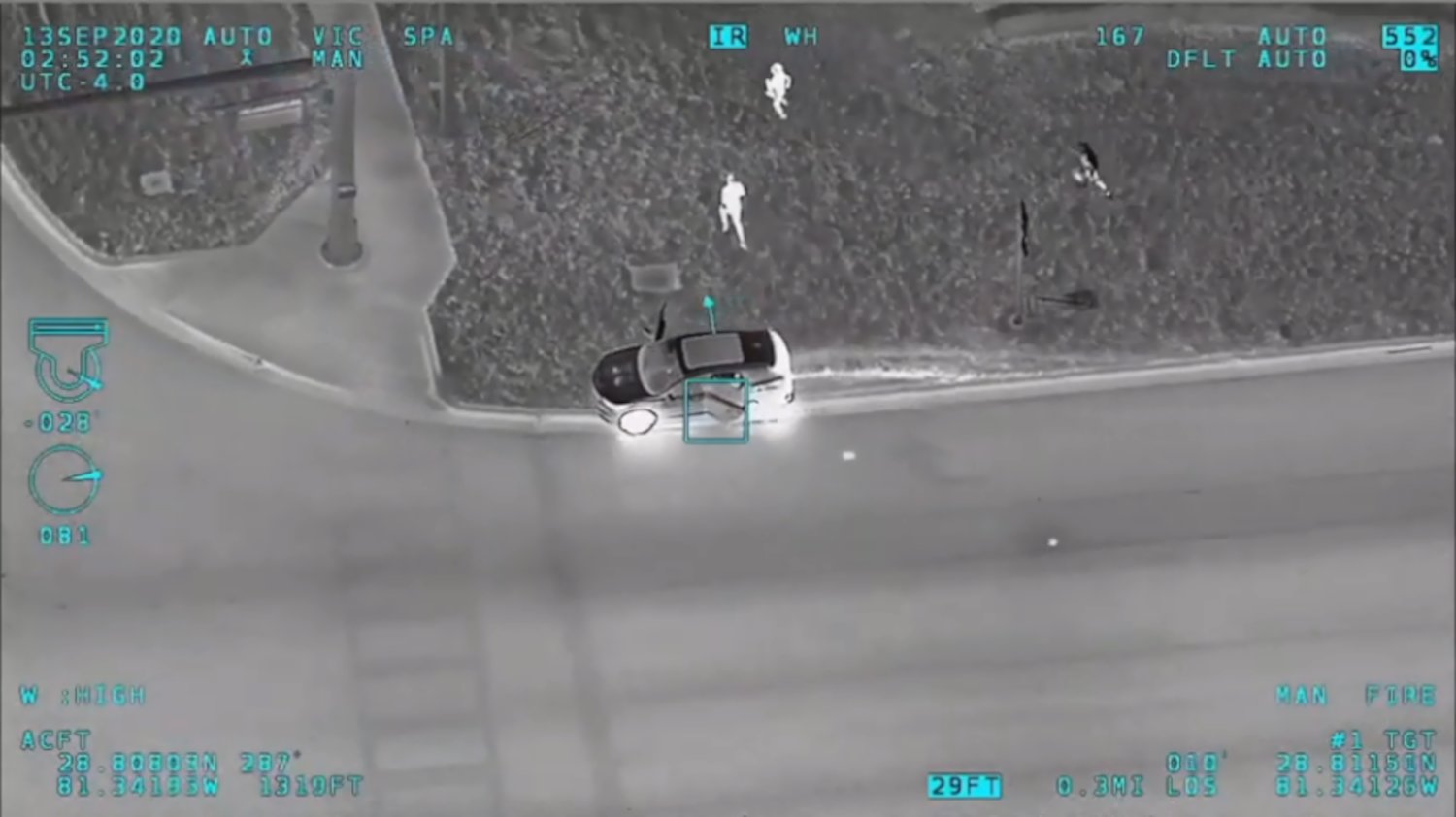 A still shot from SCSO's Alert One helicopter showing the suspects running out of their vehicle as it rolls away