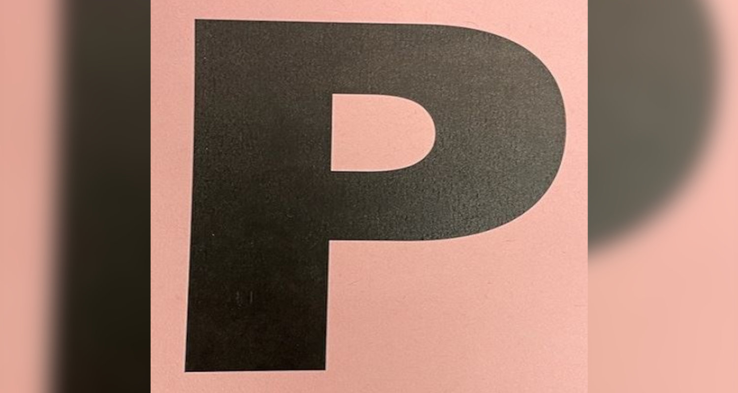 The "Pink P" passes police will give out to residents and workers who need access to the beachside during special events