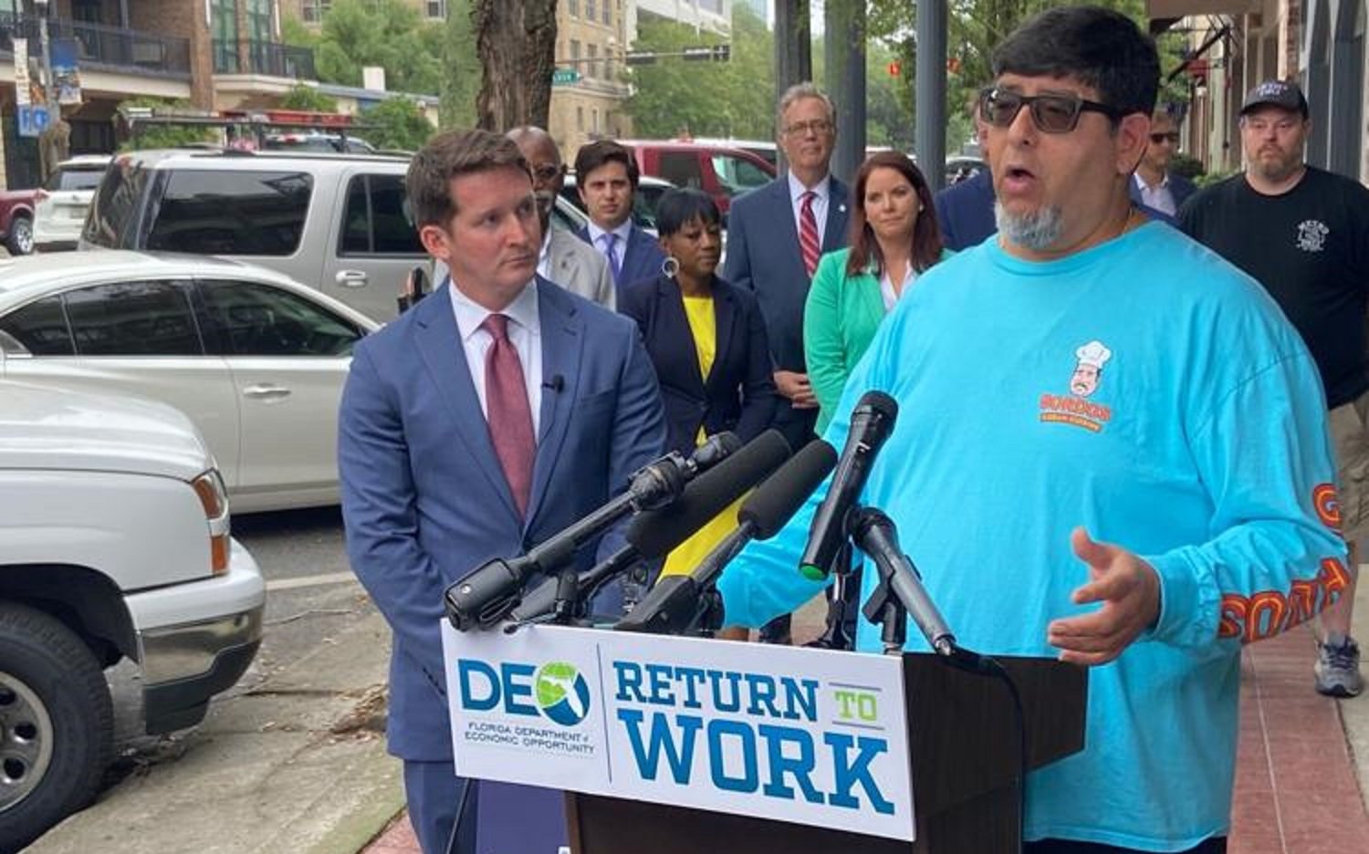 Department of Economic Opportunity Secretary Dane Eagle and Tallahassee restaurant owner Eddie Agramonte appeared at a May news conference about efforts to boost the workforce.