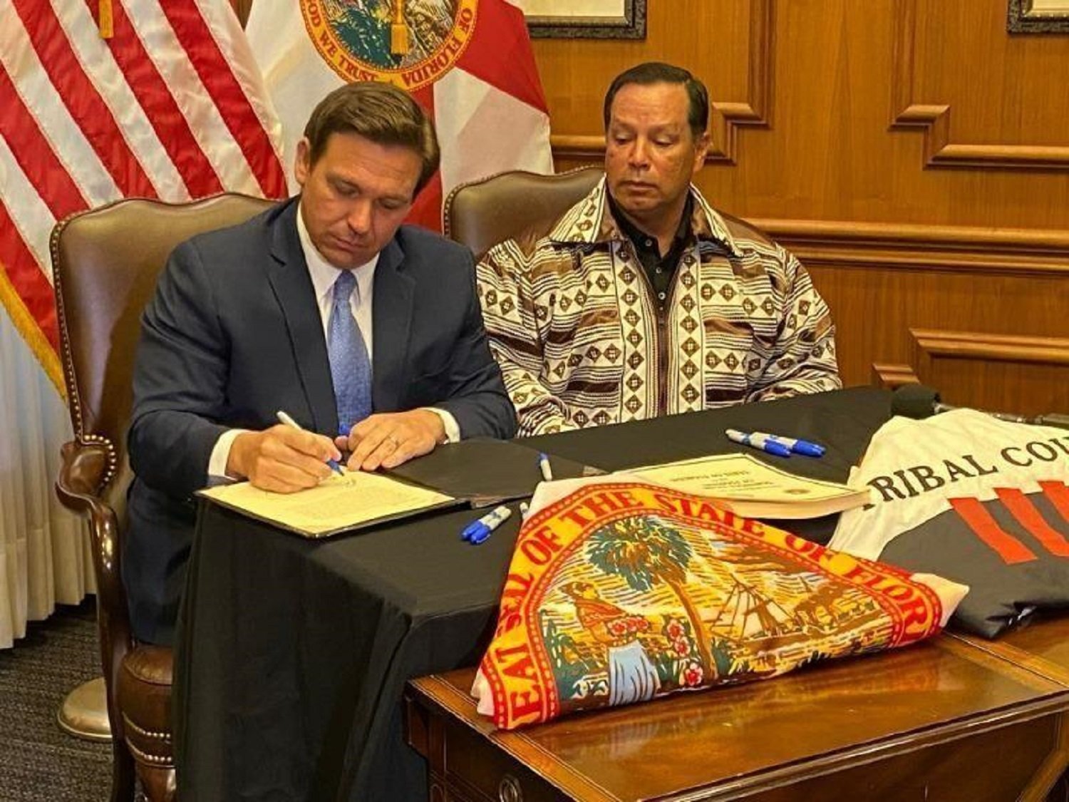 Gov. Ron DeSantis and Seminole Tribe of Florida Chairman Marcellus Osceola Jr. signed a gambling deal in April.