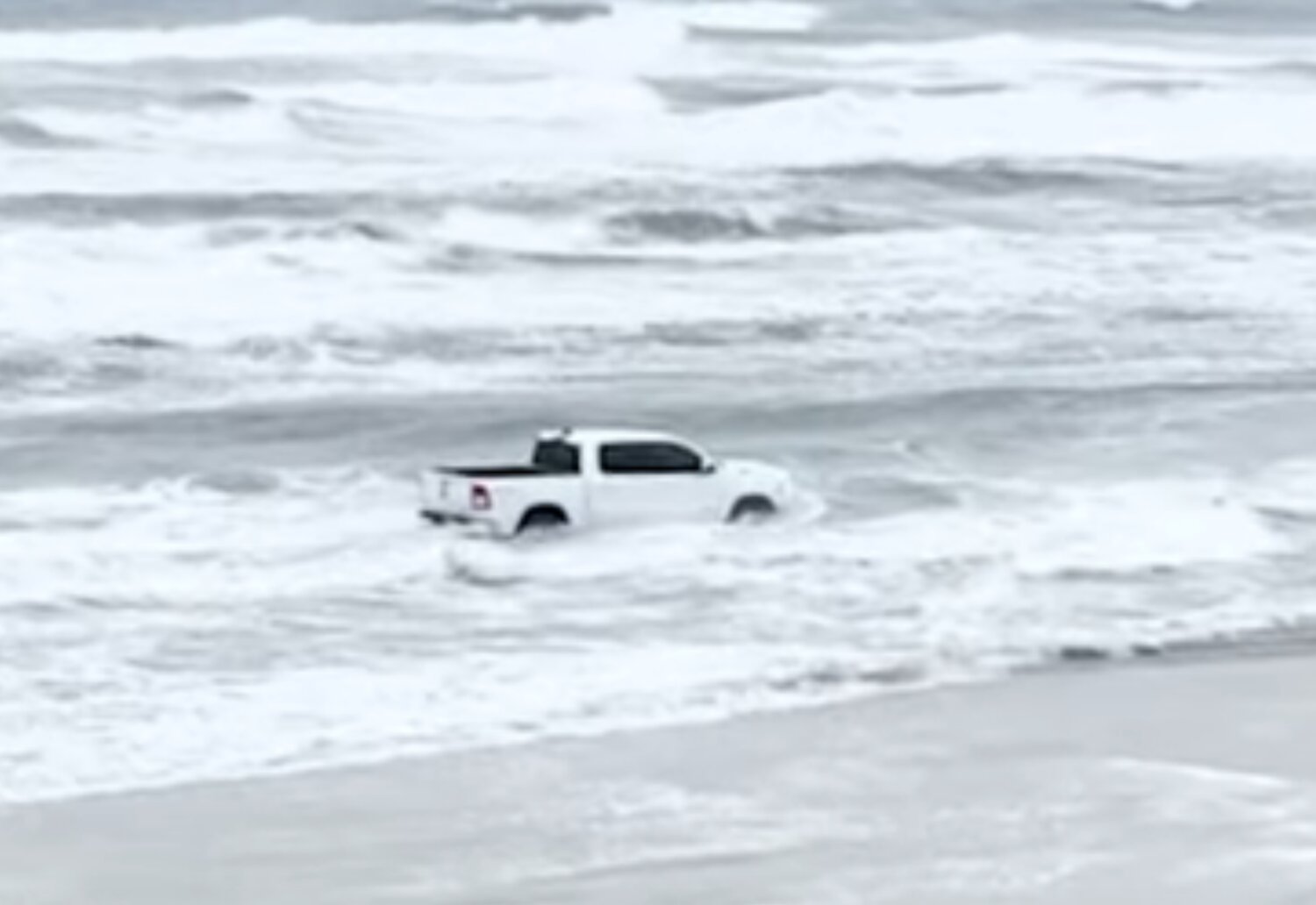 Pickup Truck Driver Arrested After Driving Into Ocean