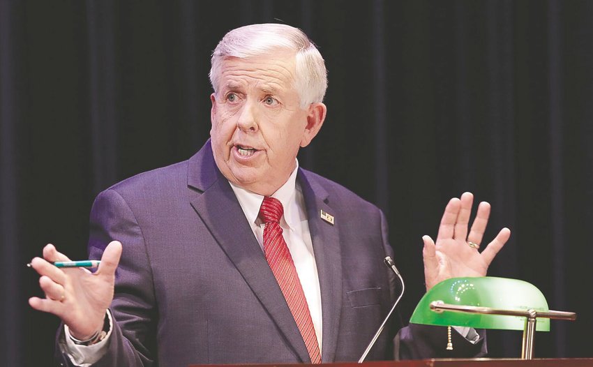 Gov. Mike Parson answers a question during the Missouri gubernatorial debate Oct. 9 at the Missouri Theatre.