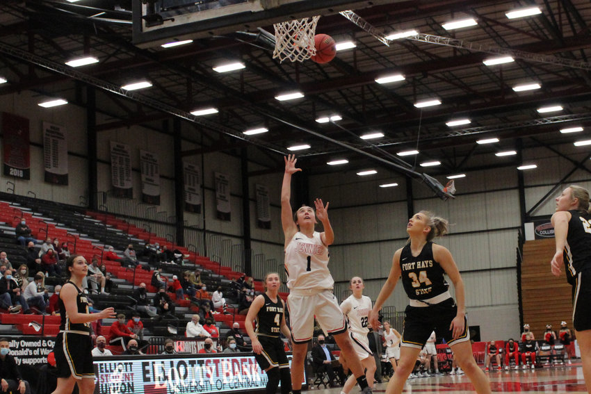 Olivia Nelson shoots the ball during the Jennies&rsquo; match against Fort Hays Thursday, Jan. 7.