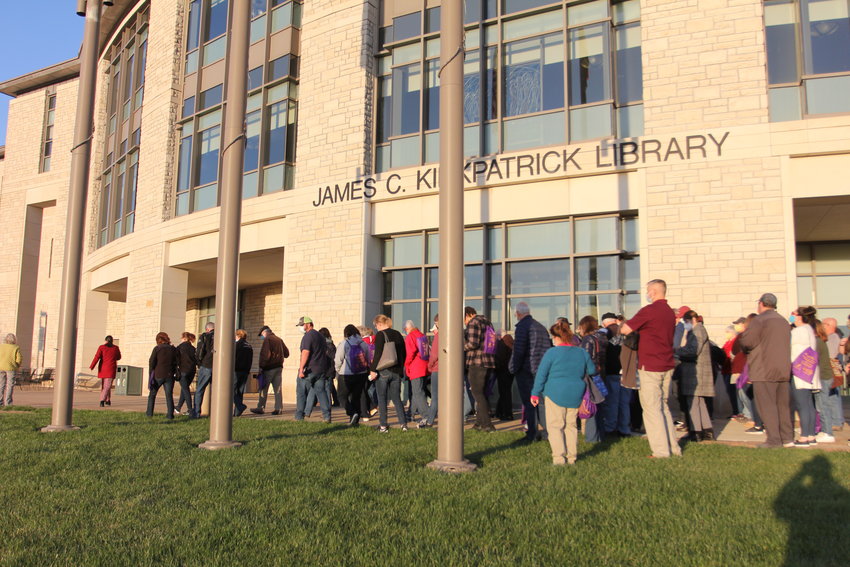The first tour group departs the James C. Kirkpatrick Library for a historic tour of the University of Central Missouri campus.&nbsp;