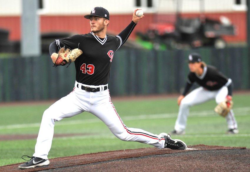 Mules senior Mason Green delivers a pitch Friday during a 2-1 victory against Henderson State in the NCAA D-II Central Region Championships at Crane Stadium/Tompkins Field in Warrensburg.