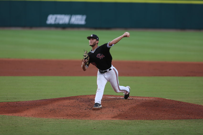 UCM starting pitcher Mason Green throws a pitch against Tampa prior to a rain delay in the NCAA Division II semifinal round Friday, June 11 in Cary, North Carolina