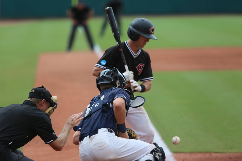 Garrett Pennington is hit by pitch against Wingate in the NCAA Division II National Championship game on Saturday, June 12, in Cary, North Carolina.