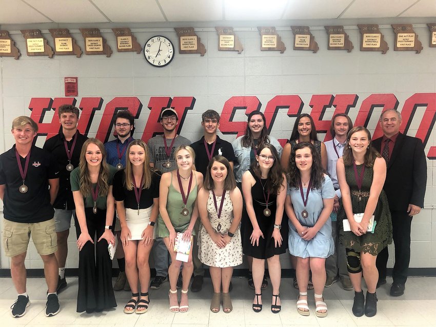 Class of 2021 four-year recipients pose for a picture at the 33rd Annual Academic Excellence Celebration.&nbsp; From left, front row, Addison Bell, Jacelynn Laws, Sydney Foulks, Rachel Dye, Rheana Goubeaux, Faith Dye and Jessica Beyer. Back row, Bradley Sachs, Eli Nappe, Quentin Weed, Parker Buckson, Mason Chapman, Danielle Richner, Allison Adlich, and William Samson.