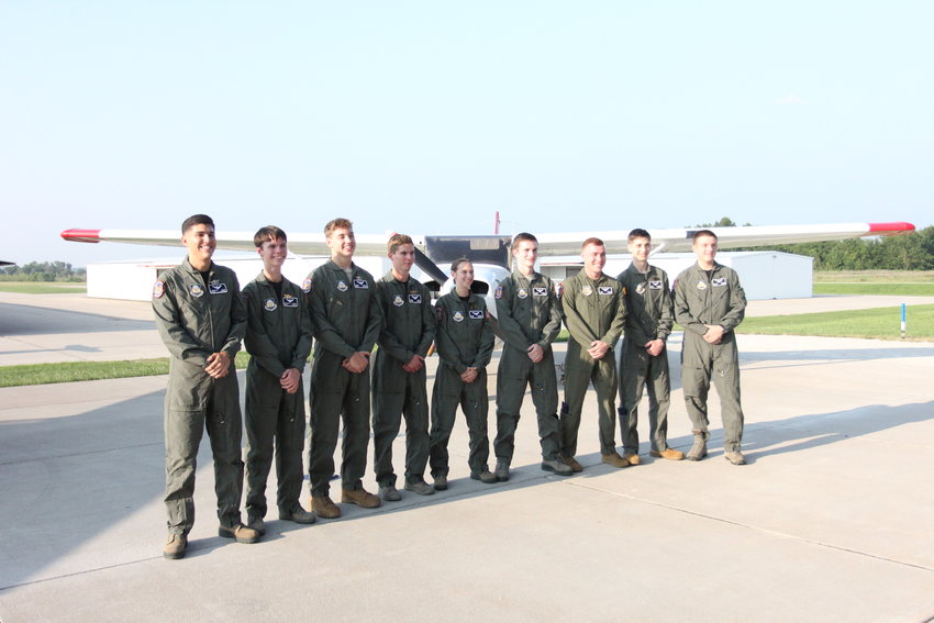 Newly graduated Flight Academy cadets pose for a picture after receiving their patches and wings Friday, July 23, at Max B. Swisher Skyhaven Airport. From left, Jonathan Willis, Nathanyal Hanson, Bruce Reinhard, Tyler Butler, Paige McCarty, Leyton Rainbolt, Adam Winters, Jared Calderon and Nicolas Quigley.&nbsp;