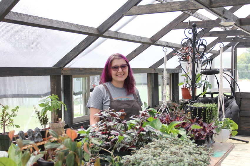 Jess Blevens poses for a photo at Well Planted Greenhouse on Thursday, Aug. 5.