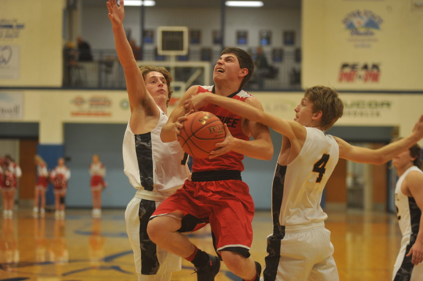 Tanner Anstine goes up for a shot against La Monte on Friday, Dec. 17, at State Fair Community College.