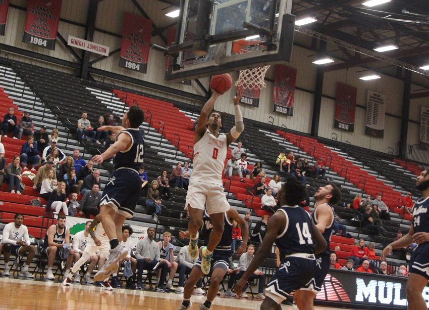 Ja&rsquo;Cor Nelson posts a jumper against Washburn on Friday, Dec. 31, at the Multipurpose Building.