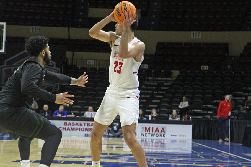 Central Missouri redshirt junior Gaven Pinkley looks for an open teammate against Northeastern State in the first round of the MIAA Tournament on Wednesday, March 2, at the Municipal Auditorium in Kansas City.