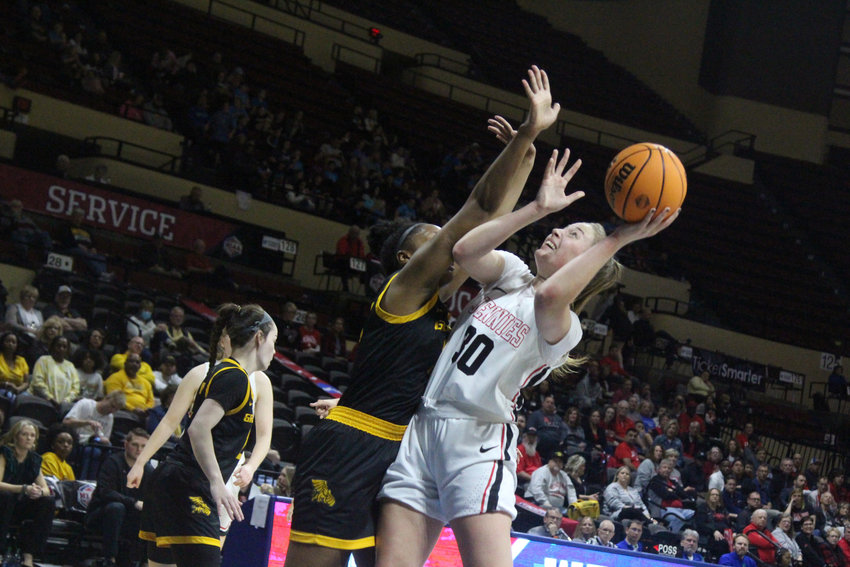 Central Missouri redshirt freshman Brooke Littrell posts a jumper against Missouri Western in the MIAA Championships quarterfinal round on Friday, March 4, at the Municipal Auditorium in Kansas City.