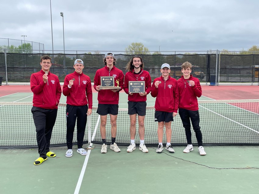 Warrensburg boys tennis poses for a photo with its MRVC medals, MRVC regular season champion plaque and MRVC tournament plaque on Wednesday, May 4, at Odessa High School.