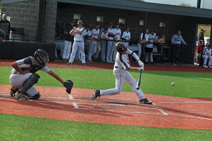 Knob Noster freshman Trent Gallagher squares a hit against Crest Ridge on Friday, May 6, at the Warrensburg Activities Complex.