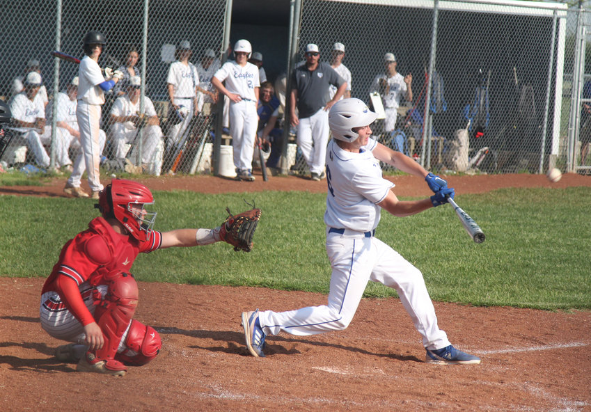 Holden senior Danny Hartzler records contact against  Richmond on Monday, May 9, at Holden High School.