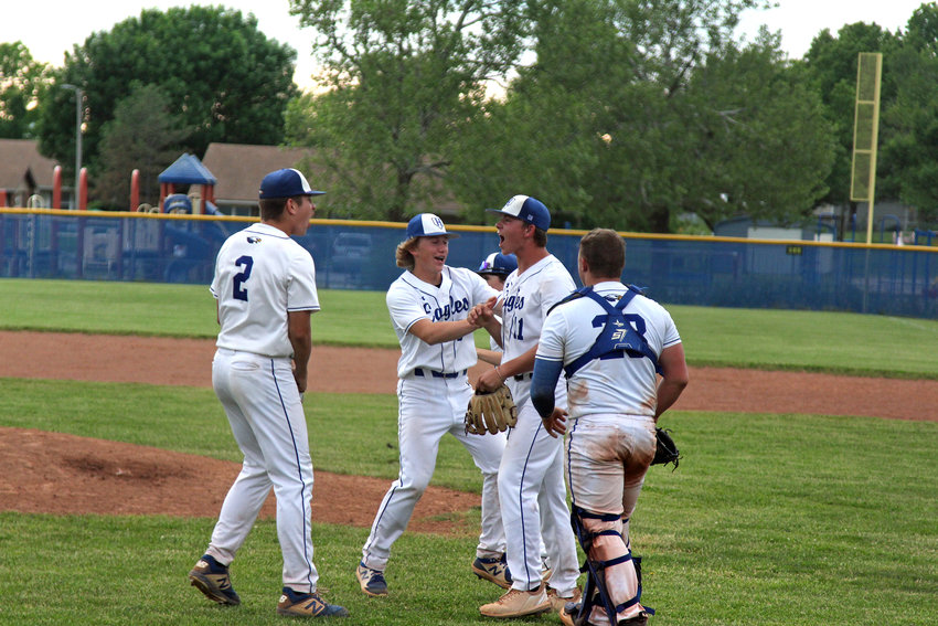 Holden baseball celebrates after recording the final out of the C3D14 championship Tuesday, May 17, at Holden High Schoool.