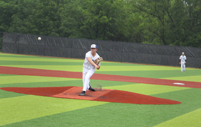 Holden junior Garrett Smith throws a pitch against Stockton on Tuesday, May 24, at the Warrensburg Activities Complex.