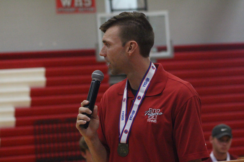 Warrensburg head coach Scott Maple addresses guests during a celebration of the 2022 MSHSAA boys tennis Class 1 Championship on Tuesday, May 31, at Warrensburg High School.