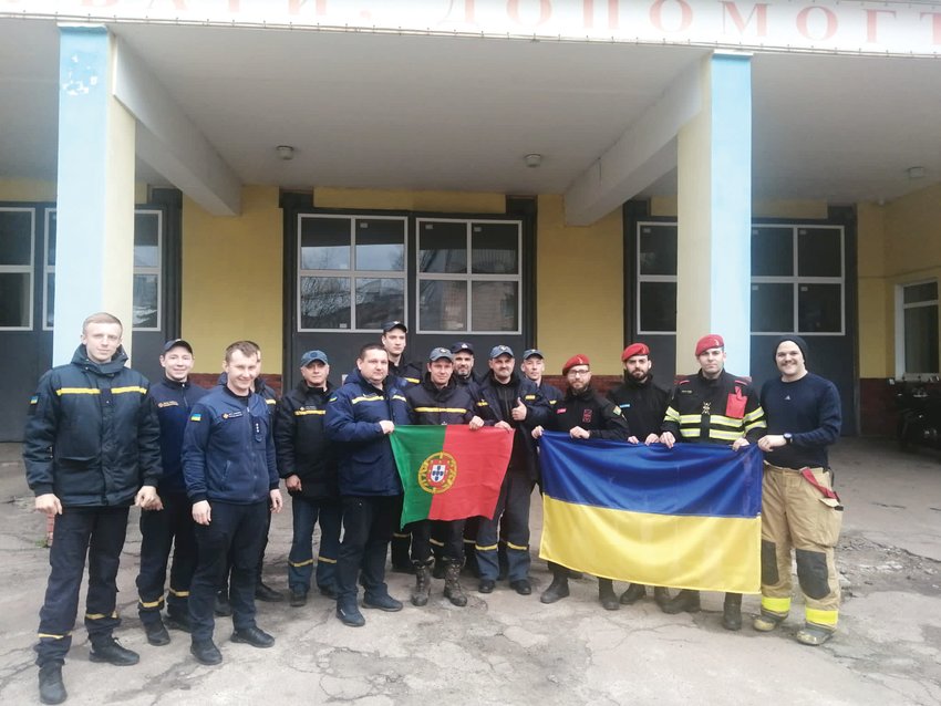 Warrensburg Firefighter Daniel Brown, right, stands with a group of foreign volunteers in Ukraine.
