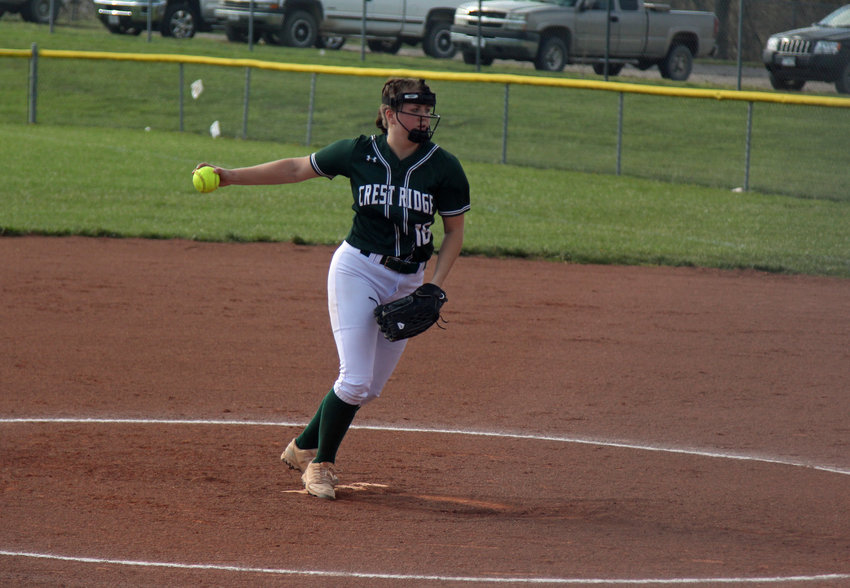 Crest Ridge junior Aubrie Dale winds a pitch against Warsaw on Friday, April 22, at Crest Ridge High School.