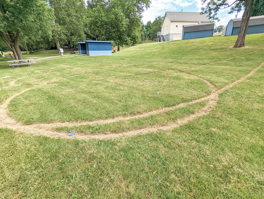 Marks can be seen at Shepard Park from a vehicle doing doughnuts in the grass. The Parks and Recreation Department has reported an increase in property damage at Warrensburg parks this summer.