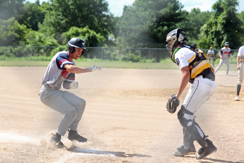 Tyler Ward crosses home plate during the Sedalia Travelers&rsquo; 3-2 loss to the Millard Sox in the American Legion Wood Bat Invitational on Friday, July 8, in Blue Springs.