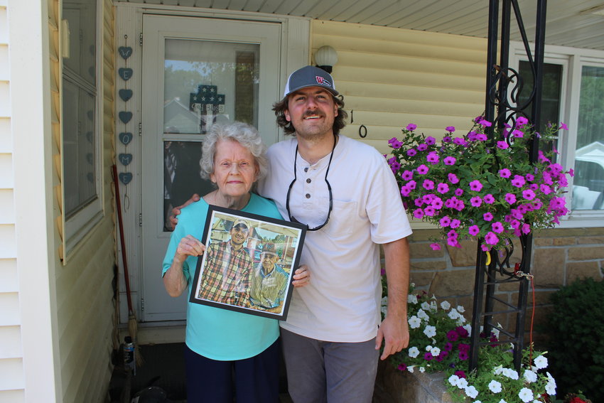 Randy and Virginia Campbell pose in front of their house in Warrensburg on Monday morning. The Campbells&rsquo; roots are deep in the community, partially thanks to their farm and the Warrensburg Farmers&rsquo; Market.
