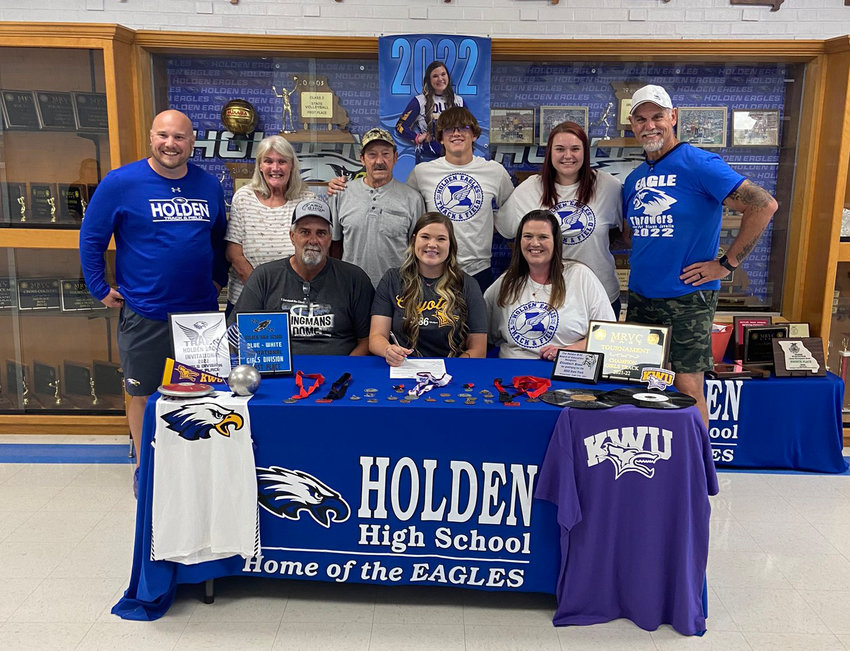 Holden High School graduate Liz Stout signed her letter of intent to continue her track and field career at Kansas Wesleyan on Sunday, July 31, at Holden High School.