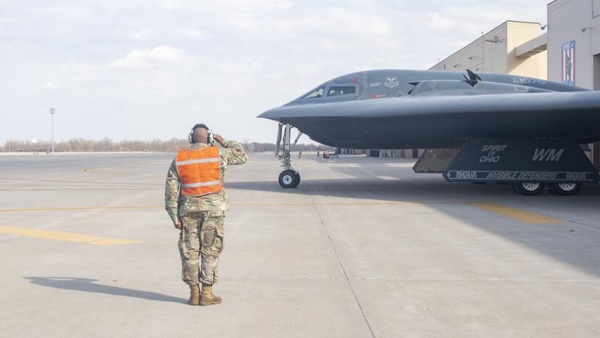 Chief Master Sgt. LeRoy E. McCardell Jr., 131st Bomb Wing command chief master sergeant, marshals and launches a B-2 Spirit stealth bomber at Whiteman Air Force Base on March 26.