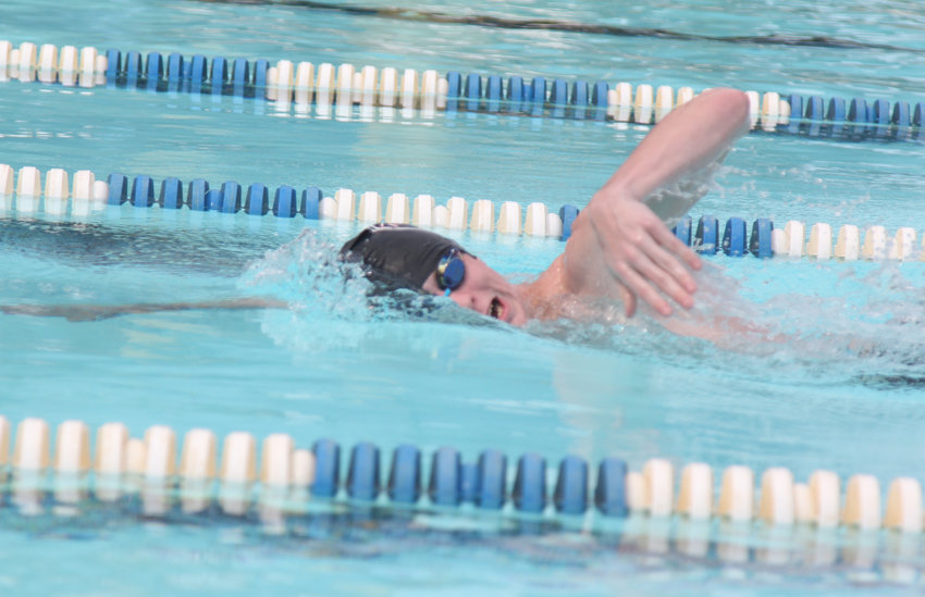 A Warrensburg swimmer completes a stroke during practice Wednesday, Aug. 24, at the Nassif Aquatic Center.