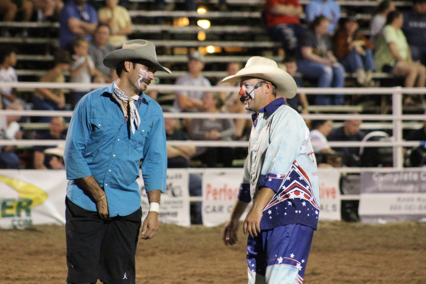 Seth Rice, right, and a fellow rodeo clown have a laugh during the 2022 Johnson County Rodeo on Saturday, Sept. 17 at the Johnson County Fairgrounds.