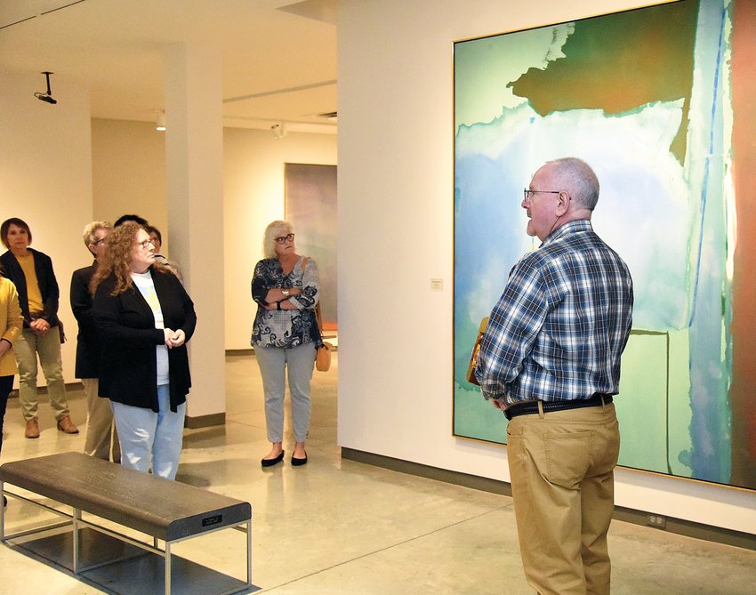 On Wednesday, Daum Museum of Contemporary Art guest curator Thomas Piche&rsquo; Jr. explains to museum docents about the current exhibition featuring work from the permanent collection. Piche&rsquo; retired in June, and new Director/Curator Garry Holstein will take the position on Oct. 1.