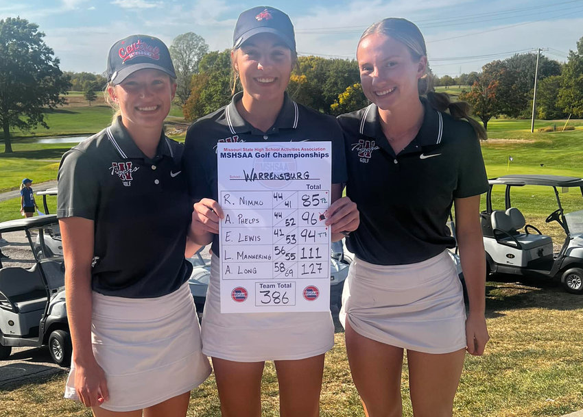 Allie Phelps, Reece Nimmo and Elise Lewis pose for a photo with Warrensburg's district scorecard Monday, Oct. 10, at the Eagles Landing Golf Course in Belton. The three will represent the Tigers at the MSHSAA Championships next week.