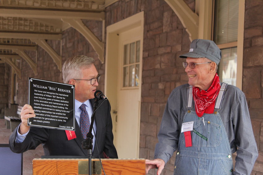 David Pearce presents William P. &quot;Bill&quot; Bernier the sign that will hang in the depot to honor his 35 years of service at the 30-year celebration of the Depot Renovation on Thursday, Oct. 27.