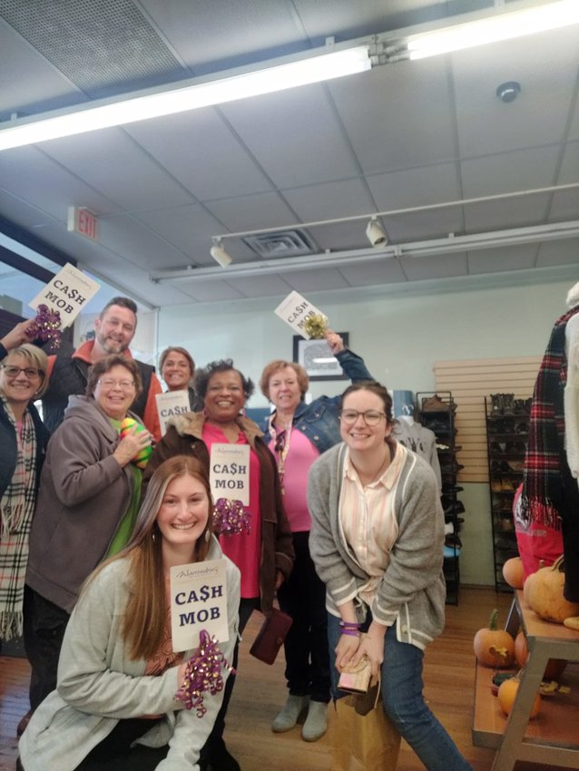 Members of the Warrensburg Chamber of Commerce Cash Mob visit the Warrensburg Salvation Army Family Thrift Store on Oct. 18.