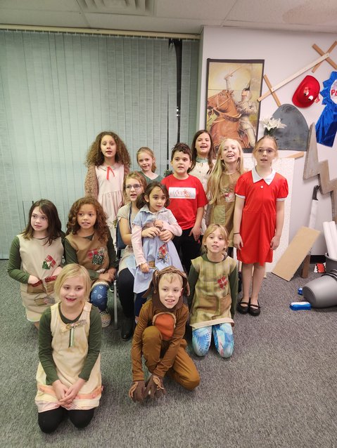 The 16 students in Theatre Kidz (beginning level), ages 5 through 12, at The Music Studio of Warrensburg pose for a photo during a rehearsal for &ldquo;Annie Kids.&rdquo; The show will be performed Dec. 21 at the Old Star Theater on West Pine Street.