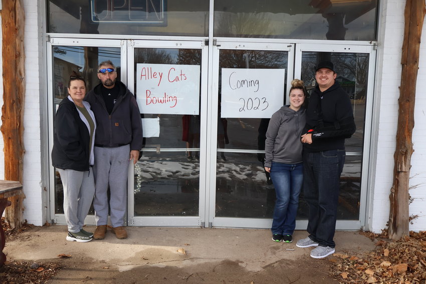 From left, Sherry, Brian, Miranda and Sterling Wahn stand in front of the soon-to-be bowling alley, Alley Cats, on Wednesday, Dec. 28. The alley is located at 822 S. Maguire St.