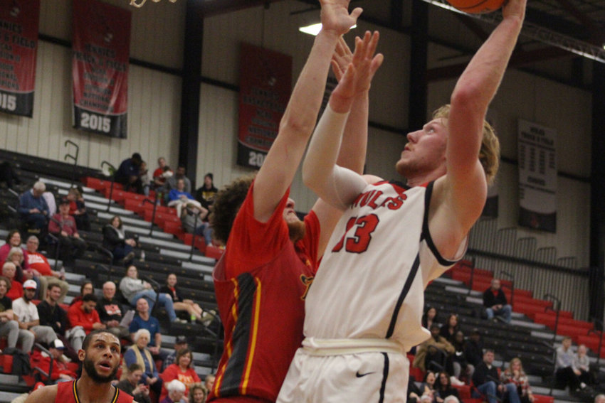 Central Missouri redshirt sophomore Ben Fritz posts a jumper against Pittsburg State on Thrusday, Feb. 2, at the Multipurpose Building.