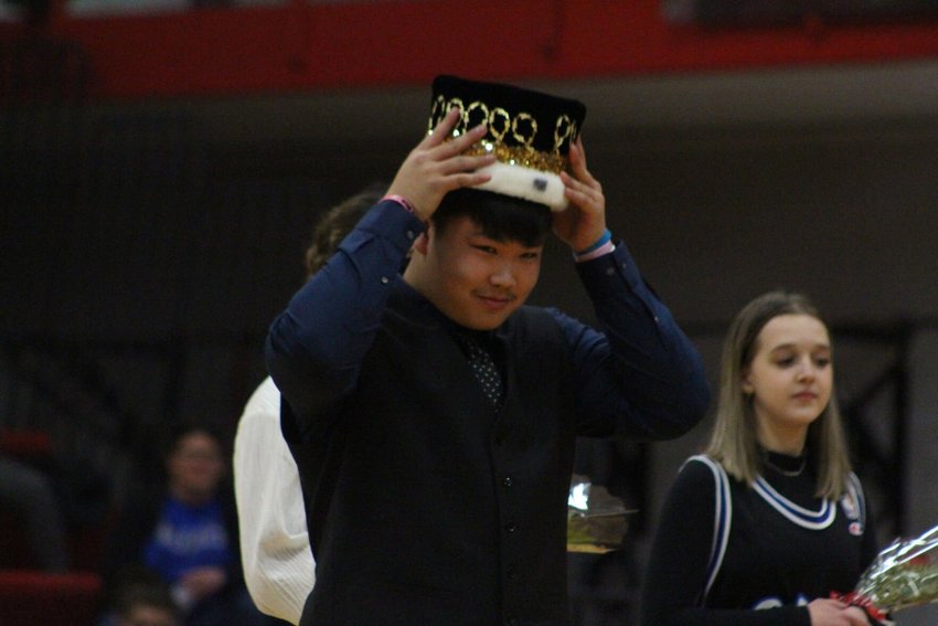 Warrensburg senior Kenny Hong is crowned as the school&rsquo;s 2023 Courtwarming King during halftime of the Tigers boys basketball game Friday, Feb. 3, at Warrensburg High School.