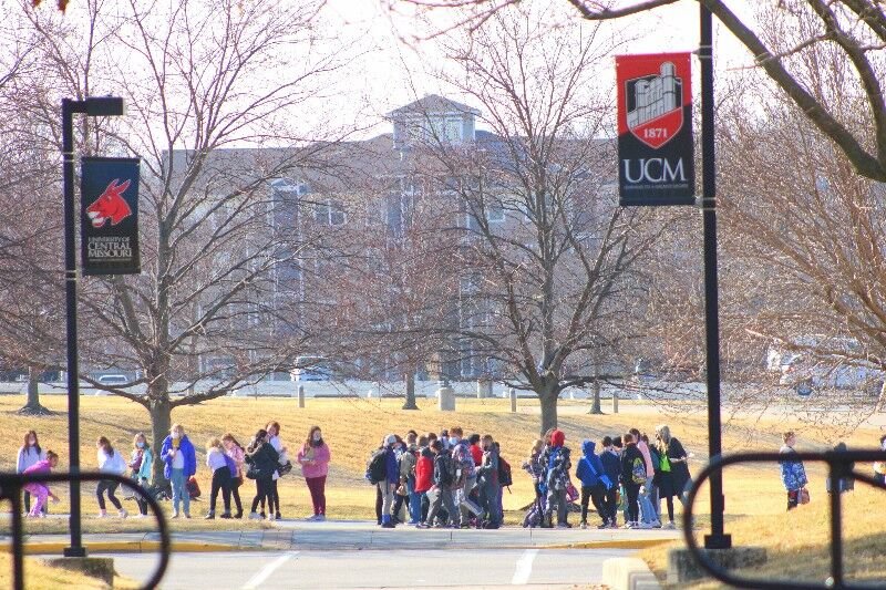A group of children walk across campus while attending the 2022 Children's Literature Festival, an event that celebrates its 54th year at UCM March 5-7.