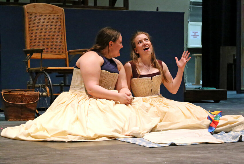 Jo March (Alannah Trigg), left, smiles at her younger sister Beth (Rachel Curry) as the pair sings &ldquo;Some Things Are Meant To Be&rdquo; during a rehearsal of &ldquo;Little Women: The Musical&rdquo; on Thursday, March 31 at the Highlander Theatre at the University of Central Missouri. The musical will be performed April 6-9.   Photo by Nicole Cooke | Star-Journal