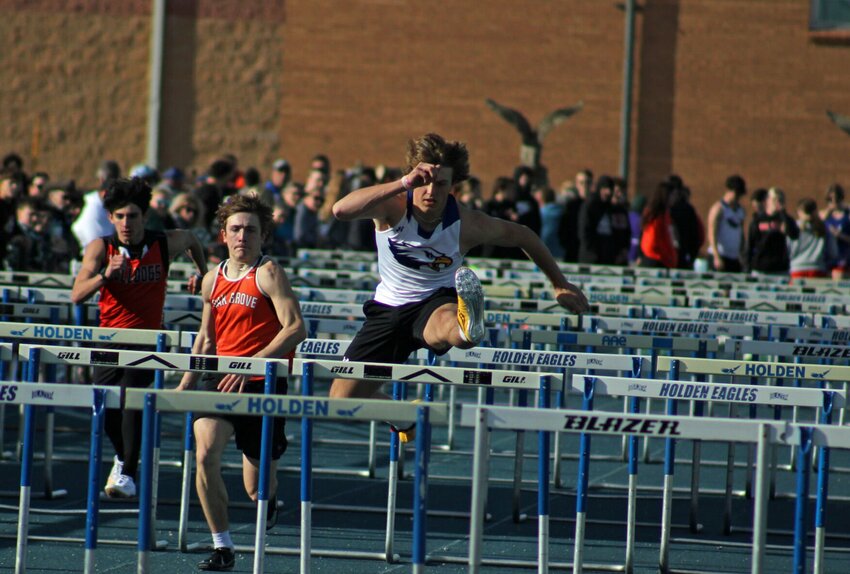 Holden junior Masyn Powell runs in the 110-meter hurdles race during the Holden Eagle Invitational on Thursday, April 6, at Holden High School.