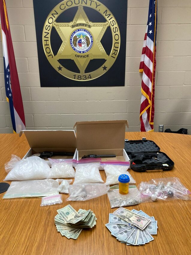 Over the past week, the Johnson County Crime Resolution Team has seized a total of 8 pounds of methamphetamine, $77,148 in cash and multiple stolen items. Pictured are items seized during a search warrant served April 26 in Kingsville.   Photo courtesy of Johnson County Sheriff's Office