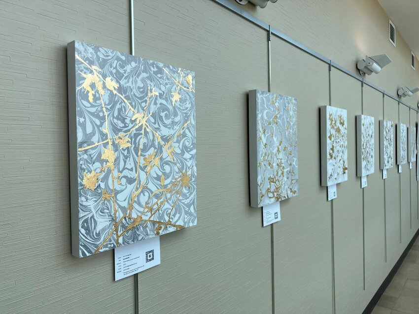 Pieces from the Golden Hour exhibit line the walls of Western Missouri Medical Center.