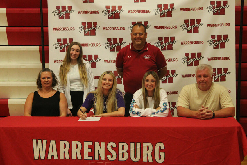 Warrensburg senior Alayna Allen signed her letter of intent to cheer at Missouri Valley College during a ceremony Tuesday, May 9, at Warrensburg High School.